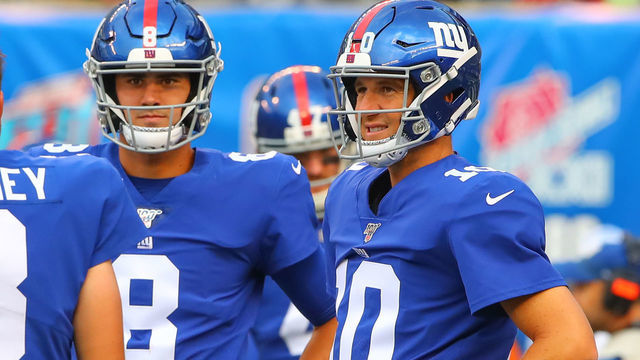 EAST RUTHERFORD, NJ - AUGUST 08: New York Giants quarterback Daniel Jones (8) amd New York Giants quarterback Eli Manning (10) prior to the National Football League pre-season football game between the New York Giants and the New York Jets on August 8, 2019 at MetLife Stadium in East Rutherford, NJ.
