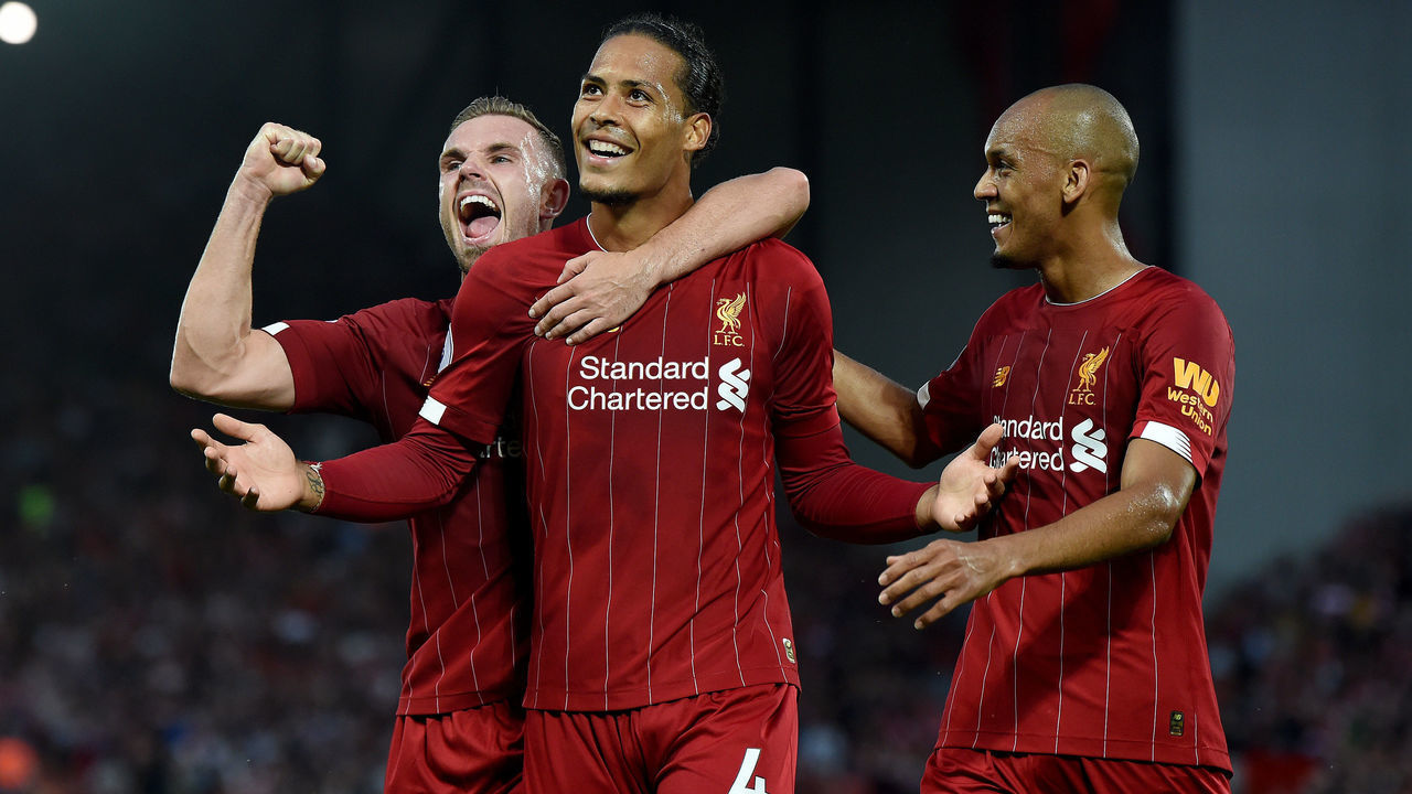 LIVERPOOL, ENGLAND - AUGUST 09: (THE SUN OUT, THE SUN ON SUNDAY OUT) Virgil Van Dijk of Liverpool celebrates his first goal during the Premier League match between Liverpool FC and Norwich City at Anfield on August 09, 2019 in Liverpool, United Kingdom.