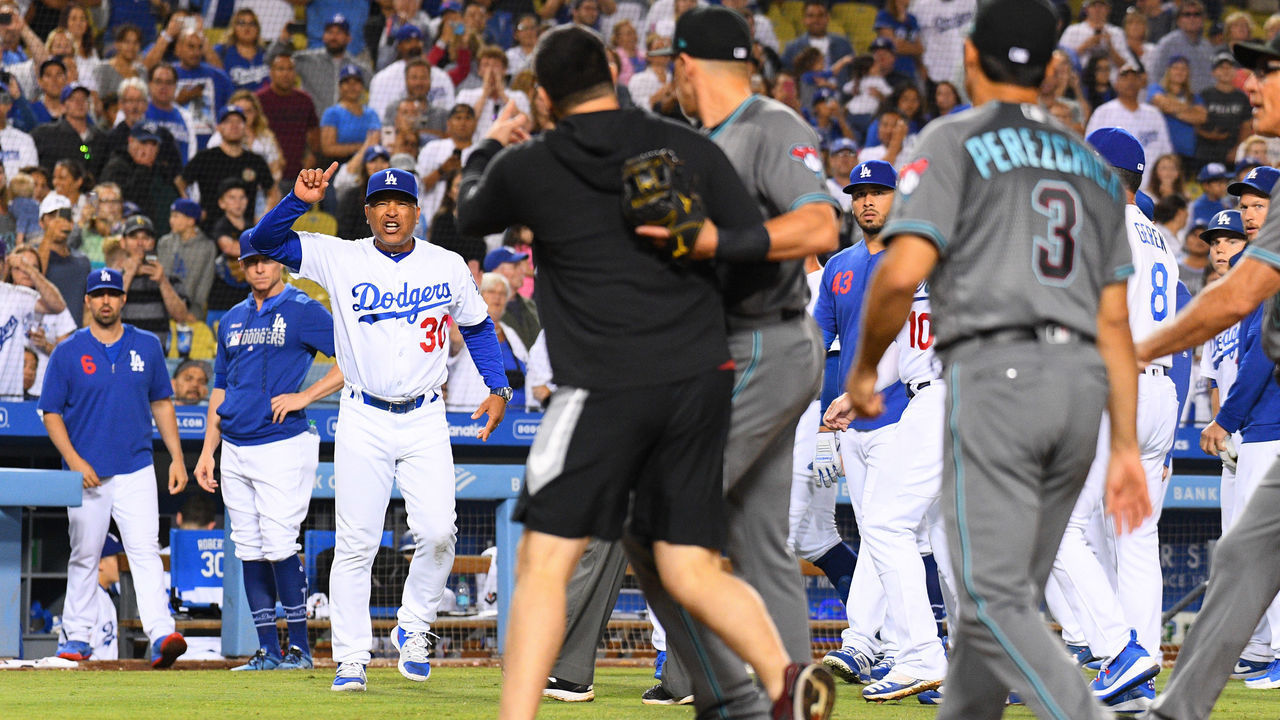LOS ANGELES, CA - AUGUST 09: Los Angeles Dodgers manager Dave Roberts yells at the Arizona Diamondbacks pitcher Robbie Ray (38) after a MLB game between the Arizona Diamondbacks and the Los Angeles Dodgers on August 9, 2019 at Dodger Stadium in Los Angeles, CA.