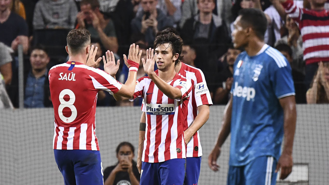 Atletico Madrid's forward Joao Felix (C) celebrates with his teammates after scoring during the International Champions Cup football match between Atletico Madrid v Juventus on August 10, 2019 in Solna outside Stockholm, Sweden.