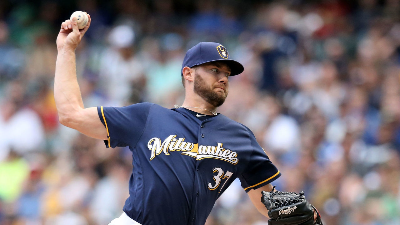 MILWAUKEE, WISCONSIN - AUGUST 10: Adrian Houser #37 of the Milwaukee Brewers pitches in the first inning against the Texas Rangers at Miller Park on August 10, 2019 in Milwaukee, Wisconsin.