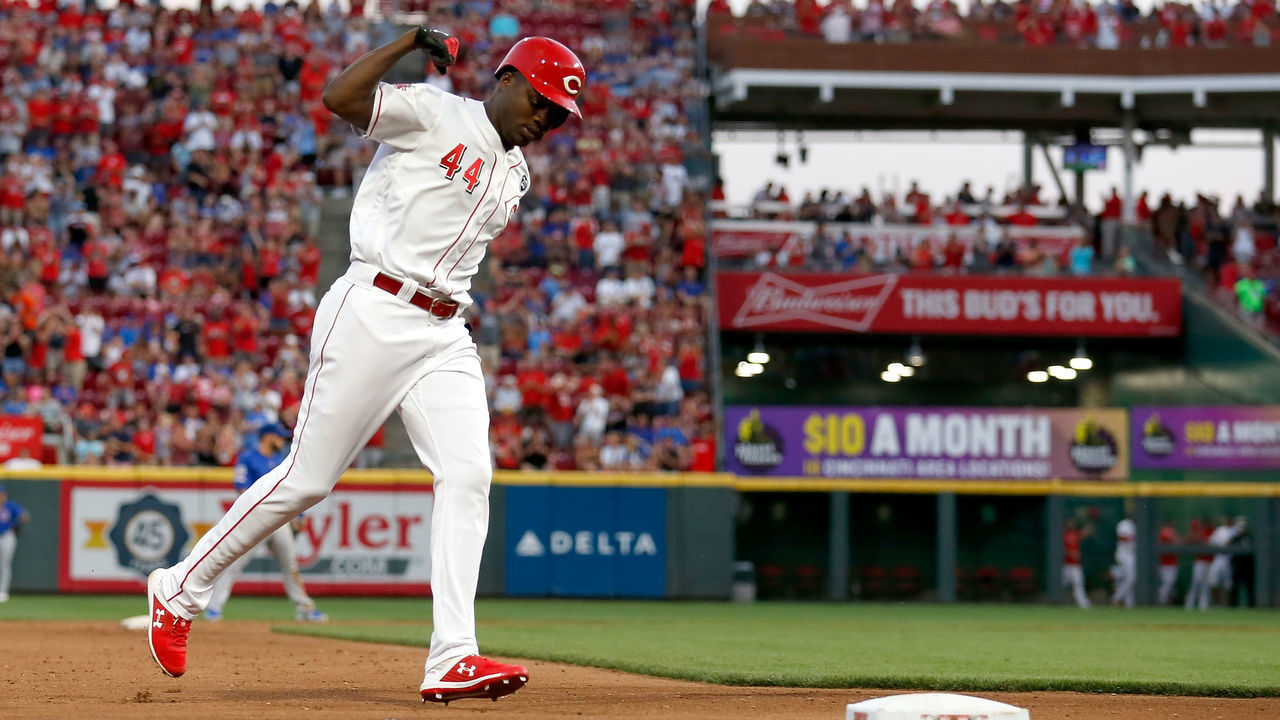 CINCINNATI, OH - AUGUST 10: Aristides Aquino #44 of the Cincinnati Reds rounds third base after hitting his third home run of the game during the fourth inning against the Chicago Cubs at Great American Ball Park on August 10, 2019 in Cincinnati, Ohio.
