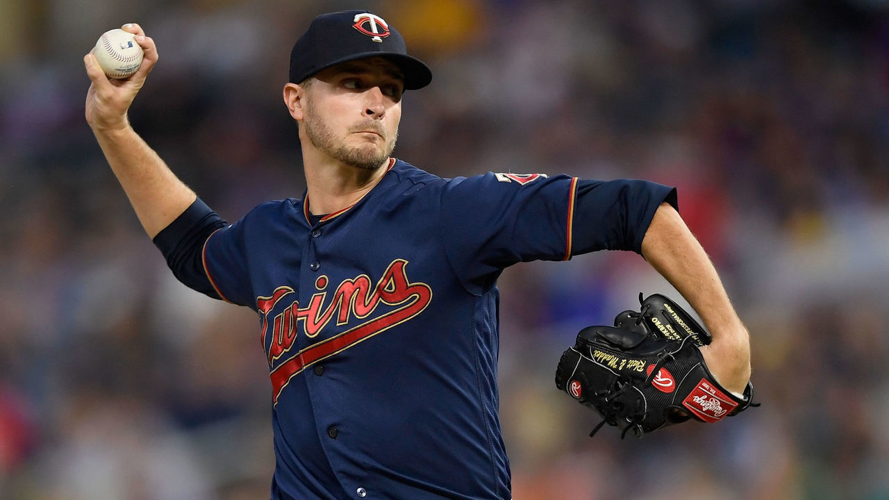 MINNEAPOLIS, MN - AUGUST 10: Jake Odorizzi #12 of the Minnesota Twins delivers a pitch against the Cleveland Indians during the first inning of the game on August 10, 2019 at Target Field in Minneapolis, Minnesota.