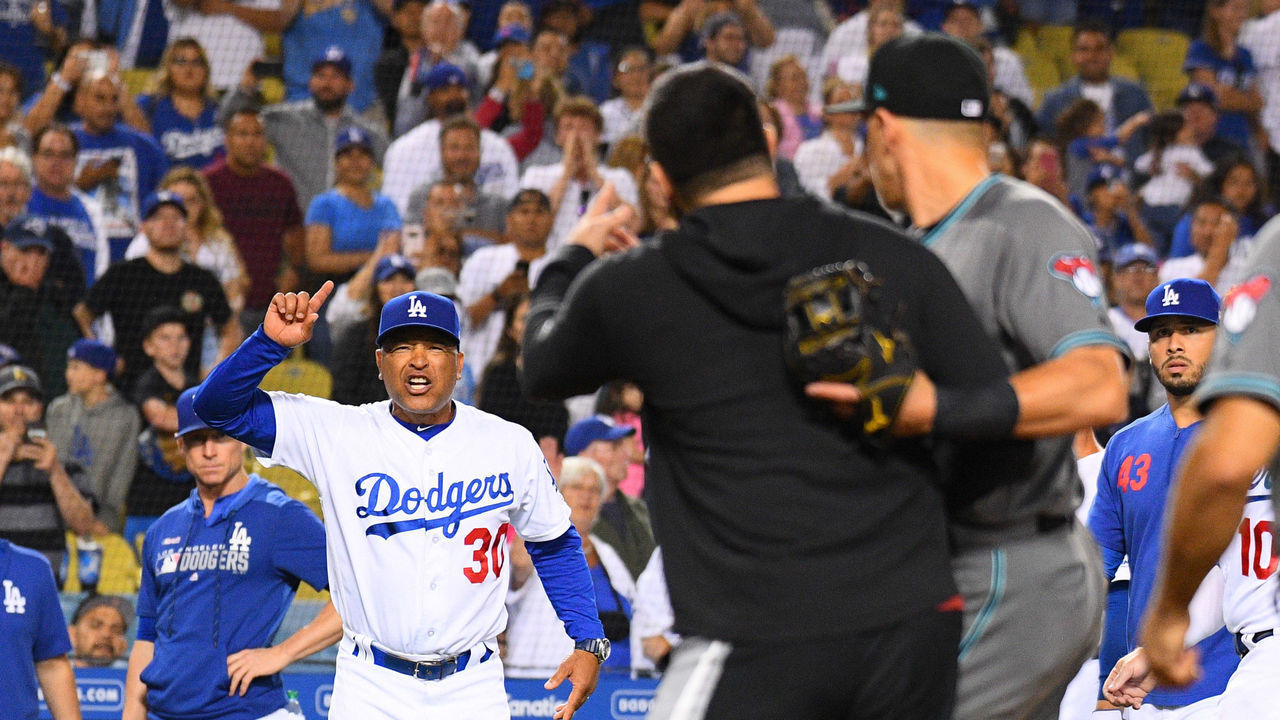 LOS ANGELES, CA - AUGUST 09: Los Angeles Dodgers manager Dave Roberts yells at the Arizona Diamondbacks pitcher Robbie Ray (38) after a MLB game between the Arizona Diamondbacks and the Los Angeles Dodgers on August 9, 2019 at Dodger Stadium in Los Angeles, CA.