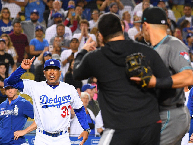 In the dugout with L.A. Dodgers head manager Dave Roberts