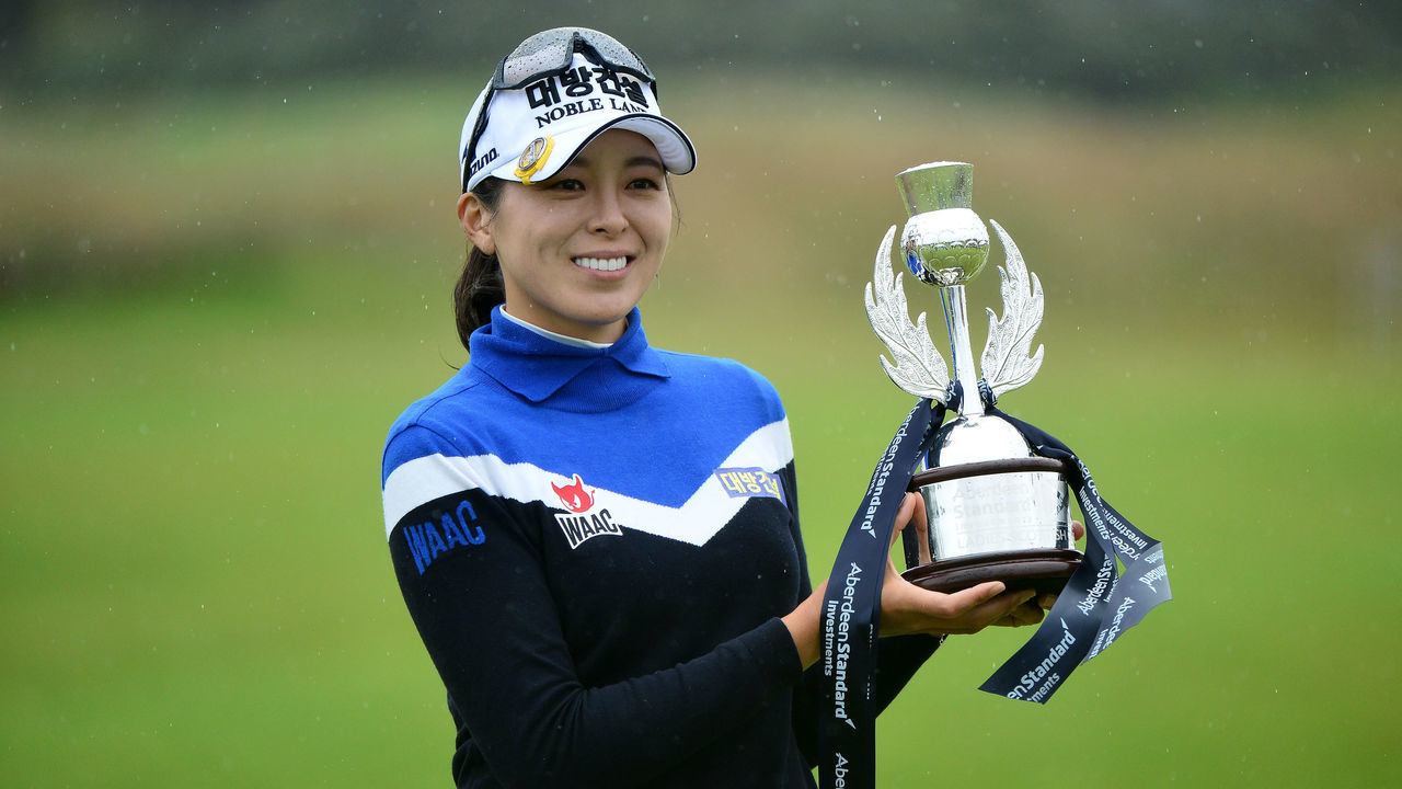 NORTH BERWICK, SCOTLAND - AUGUST 11: Mi Jung Hur of Korea lifts the trophy as she wins the Aberdeen Standard Investment Scottish Open at The Renaissance Club on August 11, 2019 in North Berwick, Scotland.
