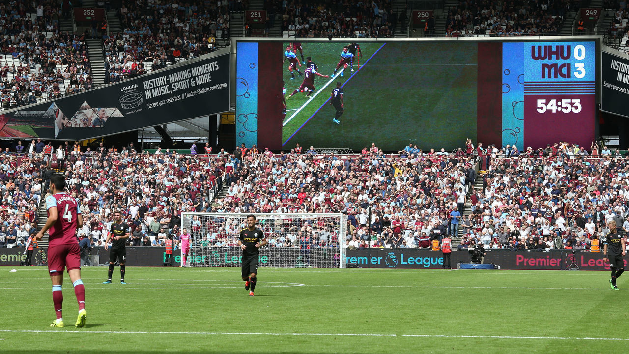 LONDON, ENGLAND - AUGUST 10: The big screens display why the third Manchester City goal has been disallowed by VAR during the Premier League match between West Ham United and Manchester City at London Stadium on August 10, 2019 in London, United Kingdom.