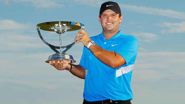 JERSEY CITY, NEW JERSEY - AUGUST 11: Patrick Reed of the United States celebrates with the winner's trophy after the final round of The Northern Trust at Liberty National Golf Club on August 11, 2019 in Jersey City, New Jersey.
