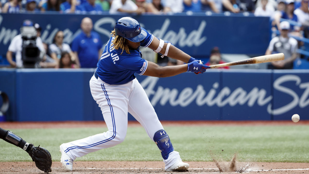 TORONTO, ON - AUGUST 11: Vladimir Guerrero Jr. #27 of the Toronto Blue Jays hits a foul ball off the dirt in the ninth inning of MLB action against the New York Yankees at Rogers Centre on August 11, 2019 in Toronto, Canada.