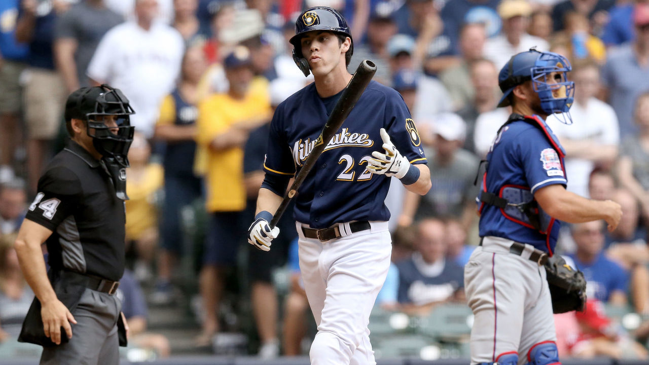 MILWAUKEE, WISCONSIN - AUGUST 11: Christian Yelich #22 of the Milwaukee Brewers walks back to the dugout after striking out in the eighth inning against the Texas Rangers at Miller Park on August 11, 2019 in Milwaukee, Wisconsin.