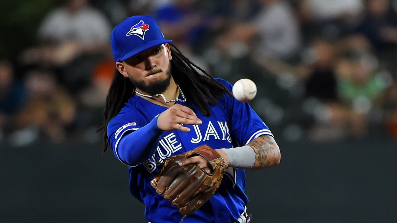 BALTIMORE, MD - AUGUST 02: Freddy Galvis #16 of the Toronto Blue Jays throws to first base during the game against the Baltimore Orioles at Oriole Park at Camden Yards on August 2, 2019 in Baltimore, Maryland.