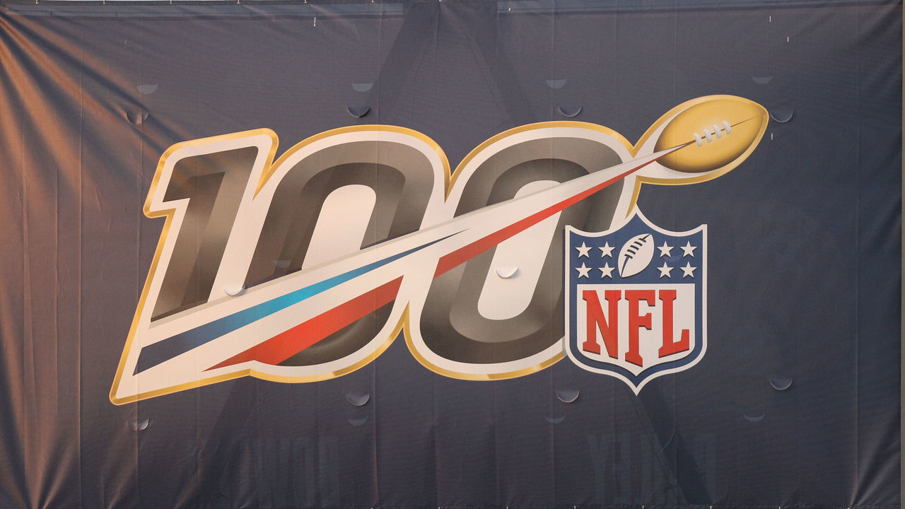 CANTON, OH - AUGUST 1: A general view of the NFL 100th anniversary logo is seen on a banner mounted to a light stand during the Hall of Fame Game between the Atlanta Falcons and the Denver Broncos played at Tom Benson Hall of Fame Stadium in Canton, Ohio.