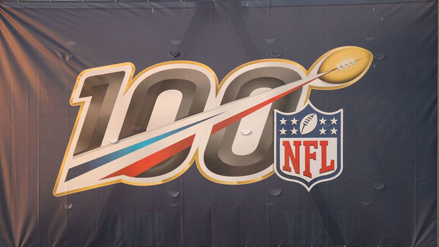 CANTON, OH - AUGUST 1: A general view of the NFL 100th anniversary logo is seen on a banner mounted to a light stand during the Hall of Fame Game between the Atlanta Falcons and the Denver Broncos played at Tom Benson Hall of Fame Stadium in Canton, Ohio.