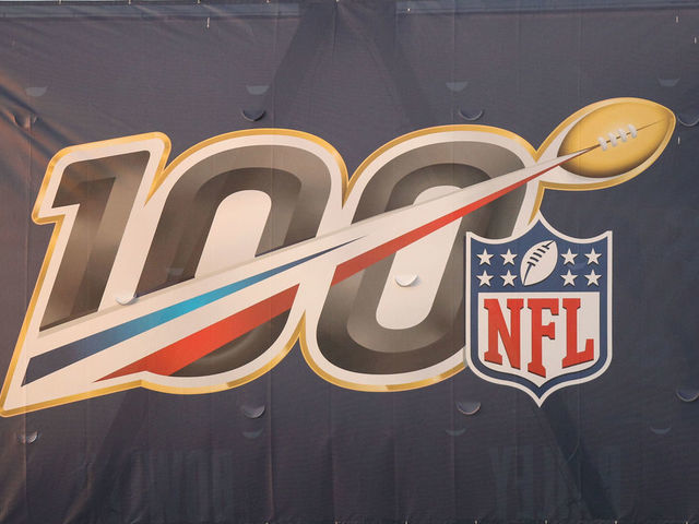 CANTON, OH - AUGUST 1: A general view of the NFL 100th anniversary logo is seen on a banner mounted to a light stand during the Hall of Fame Game between the Atlanta Falcons and the Denver Broncos played at Tom Benson Hall of Fame Stadium in Canton, Ohio.