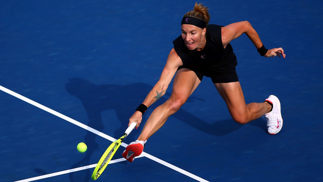 TORONTO, ON - AUGUST 08: Svetlana Kuznetsova of Russia hits a shot against Simona Halep of Romania during a third round match on Day 6 of the Rogers Cup at Aviva Centre on August 08, 2019 in Toronto, Canada.