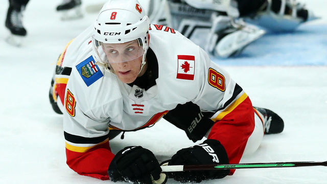 LOS ANGELES, CALIFORNIA - APRIL 01: Juuso Valimaki #8 of the Calgary Flames falls during a play against the Los Angeles Kings during the third period at Staples Center on April 01, 2019 in Los Angeles, California.