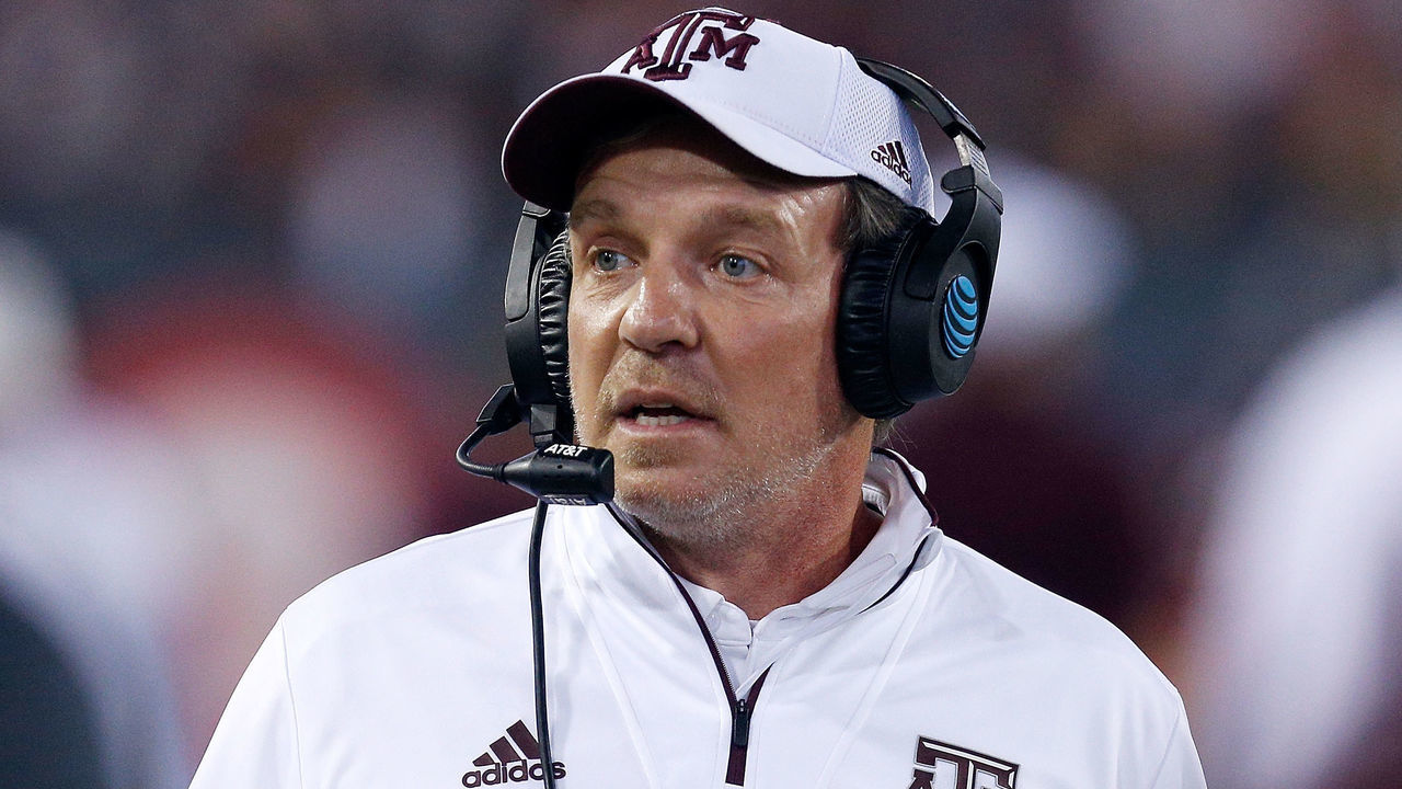 JACKSONVILLE, FL - DECEMBER 31: Head coach Jimbo Fisher of the Texas A&M Aggies looks on against the North Carolina State Wolfpack during the TaxSlayer Gator Bowl at TIAA Bank Field on December 31, 2018 in Jacksonville, Florida.