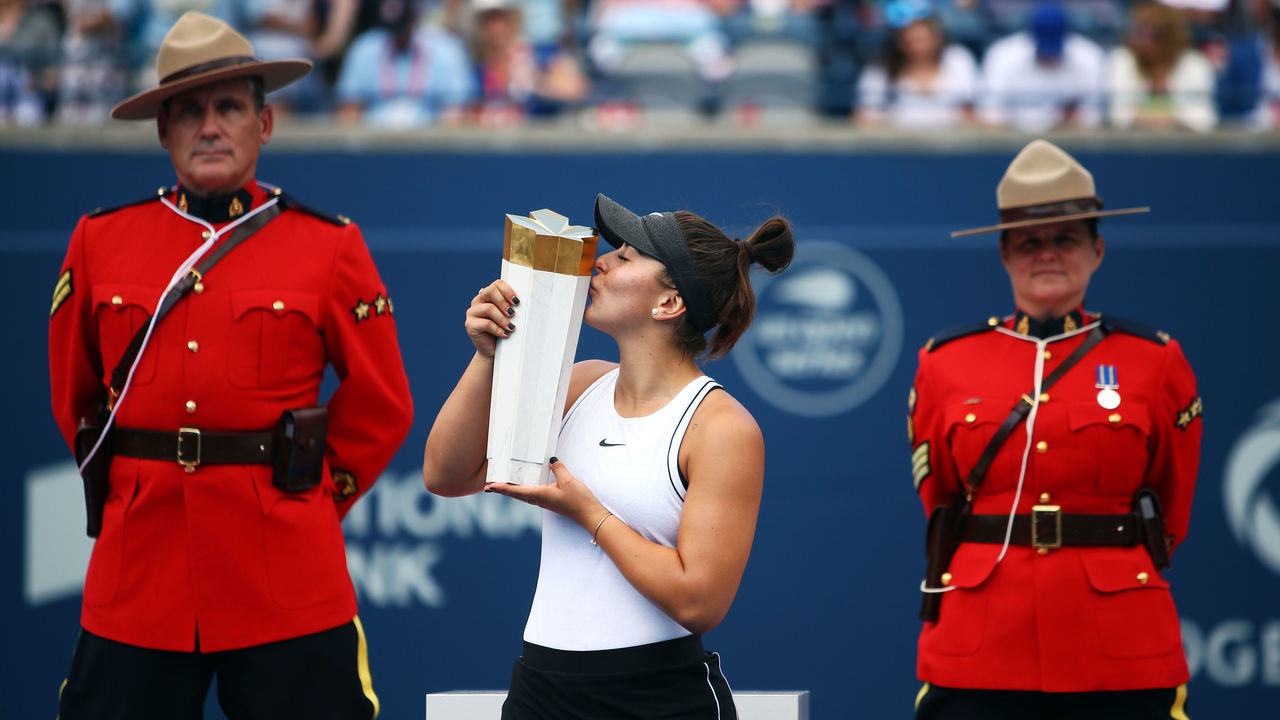 TORONTO, ON - AUGUST 11: Bianca Andreescu of Canada with the winners trophy following her victory over Serena Williams of the United States in the final match on Day 9 of the Rogers Cup at Aviva Centre on August 11, 2019 in Toronto, Canada. Williams withdrew from the match with a back injury.