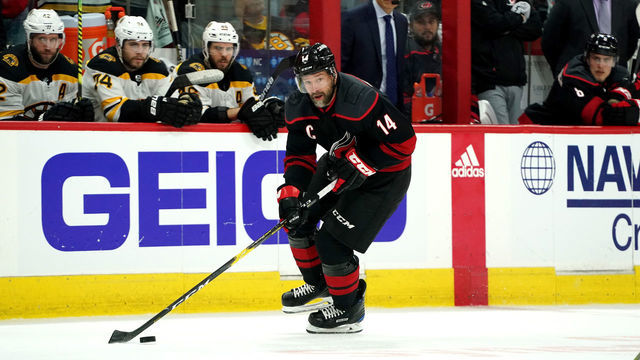 RALEIGH, NC - MAY 16: Justin Williams #14 of the Carolina Hurricanes skates with the puck in Game Four of the Eastern Conference Third Round against the Boston Bruins during the 2019 NHL Stanley Cup Playoffs on May 16, 2019 at PNC Arena in Raleigh, North Carolina.