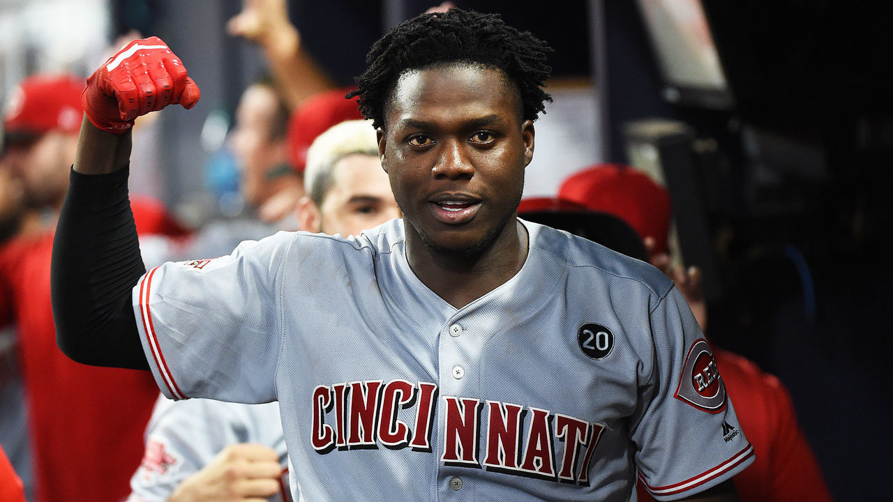 ATLANTA, GEORGIA - AUGUST 03: Aristides Aquino #44 of the Cincinnati Reds celebrates after hitting game tying 3-run home run against the Atlanta Braves at SunTrust Park on August 03, 2019 in Atlanta, Georgia.
