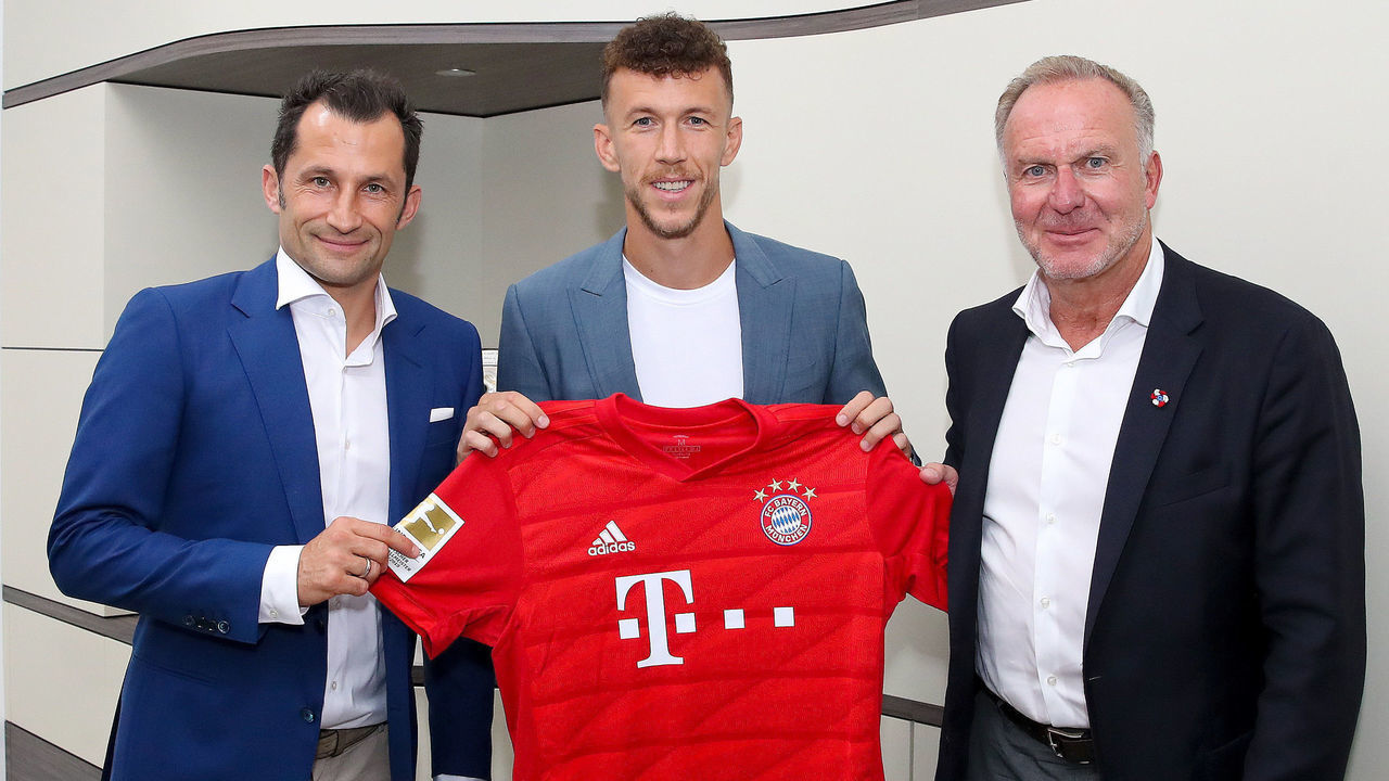 MUNICH, GERMANY - AUGUST 13: (EXCLUSIVE COVERAGE) FC Bayern Muenchen chairman of the board Karl-Heinz Rummenigge (L) FC Bayern Muenchen sport manager Hasan Salihamidzic (R) and newly signed player Ivan Perisic (C) pose for a picture at Saebener Strasse training ground on August 13, 2019 in Munich, Germany.