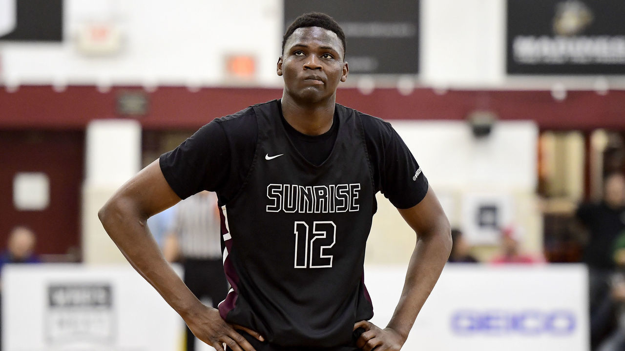 MIDDLE VILLAGE, NEW YORK - APRIL 04: N’Faly Dante #12 of Sunrise Christian Academy looks on against IMG Academy in the quarterfinal of the GEICO High School National Tournament at Christ the King High School on April 04, 2019 in Middle Village, New York.
