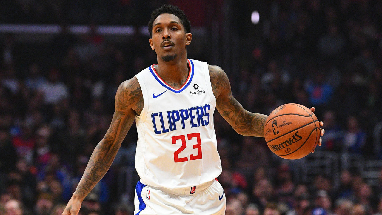 LOS ANGELES, CA - MARCH 12: Los Angeles Clippers Guard Lou Williams (23) brings the ball up the court during a NBA game between the Portland Trail Blazers and the Los Angeles Clippers on March 12, 2019 at STAPLES Center in Los Angeles, CA.