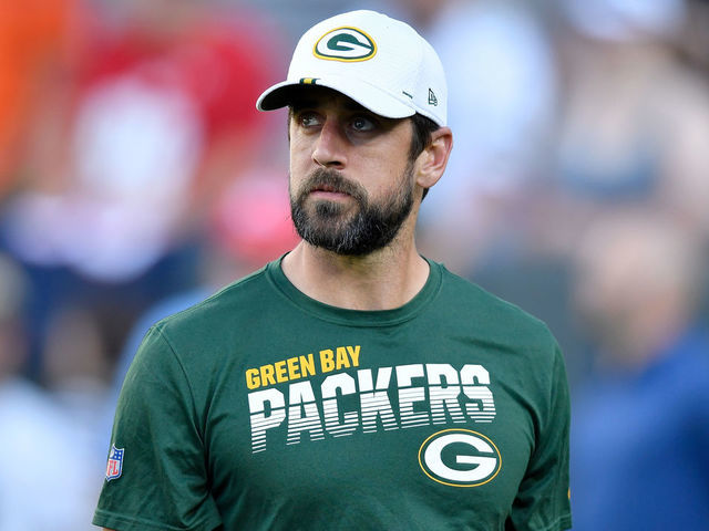 GREEN BAY, WISCONSIN - AUGUST 08: Aaron Rodgers #12 of the Green Bay Packers walks across the field before a preseason game against the Houston Texans at Lambeau Field on August 08, 2019 in Green Bay, Wisconsin.