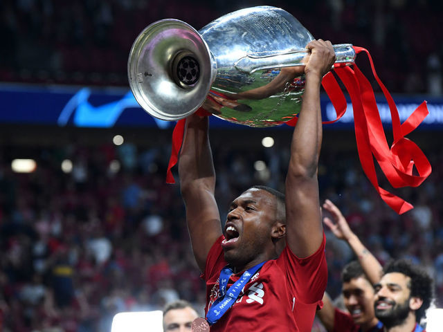 MADRID, SPAIN - JUNE 01: Daniel Strurridge of Liverpool celebrates with the trophy after the UEFA Champions League Final between Tottenham Hotspur and Liverpool at Estadio Wanda Metropolitano on June 01, 2019 in Madrid, Spain.