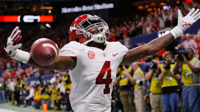 ATLANTA, GA - DECEMBER 01: Jerry Jeudy #4 of the Alabama Crimson Tide celebrates scoring a touchdown against the Georgia Bulldogs in the fourth quarter during the 2018 SEC Championship Game at Mercedes-Benz Stadium on December 1, 2018 in Atlanta, Georgia.