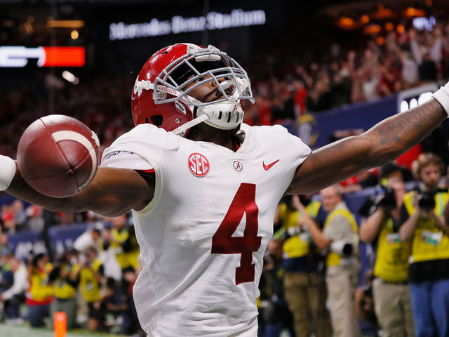 ATLANTA, GA - DECEMBER 01: Jerry Jeudy #4 of the Alabama Crimson Tide celebrates scoring a touchdown against the Georgia Bulldogs in the fourth quarter during the 2018 SEC Championship Game at Mercedes-Benz Stadium on December 1, 2018 in Atlanta, Georgia.