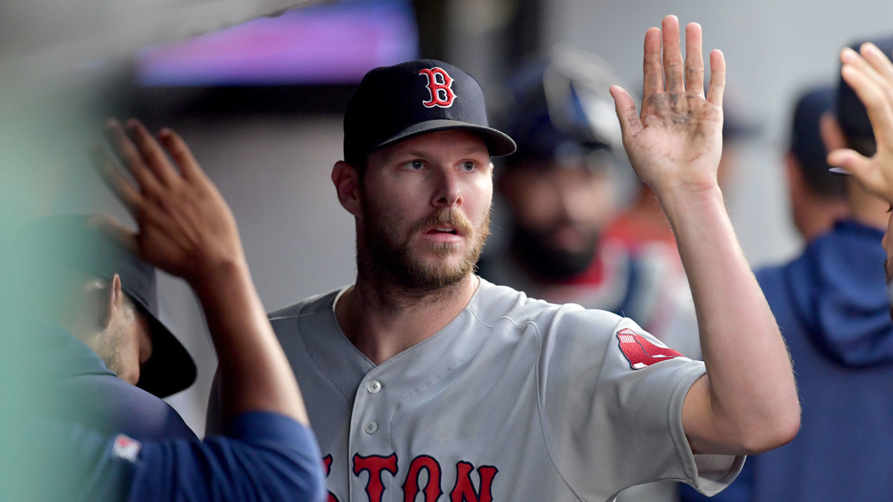 CLEVELAND, OHIO - AUGUST 13: Starting pitcher Chris Sale #41 of the Boston Red Sox celebrates after throwing his 2,000th career strike out to end the third inning against the Cleveland Indians at Progressive Field on August 13, 2019 in Cleveland, Ohio.