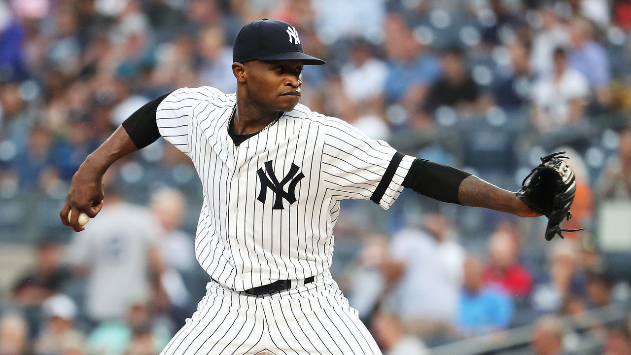 NEW YORK, NEW YORK - AUGUST 11: Domingo German #55 of the New York Yankees pitches against the Baltimore Orioles during their game at Citi Field on August 11, 2019 in New York City.