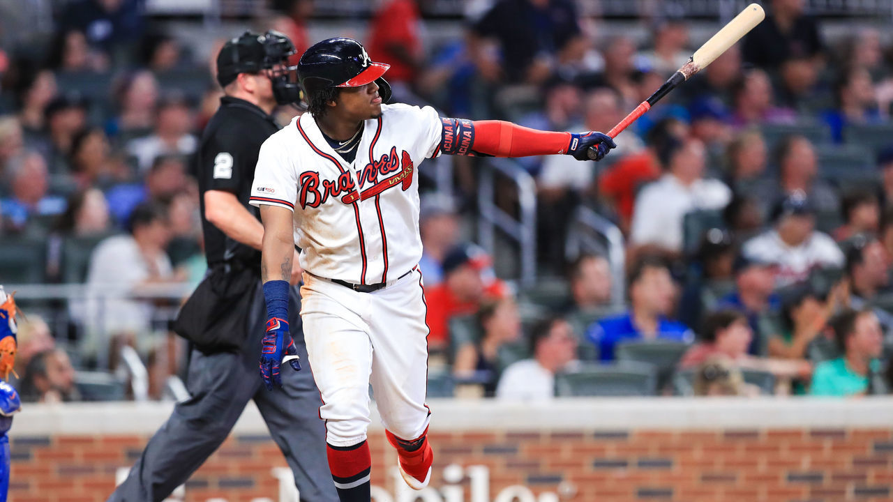 ATLANTA, GA - AUGUST 13: Ronald Acuna Jr. #13 of the Atlanta Braves hits a home run in fourth inning during the game against the New York Mets at SunTrust Park on August 13, 2019 in Atlanta, Georgia.