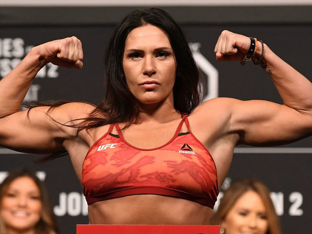 INGLEWOOD, CA - DECEMBER 28: Cat Zingano poses on the scale during the UFC 232 weigh-in inside The Forum on December 28, 2018 in Inglewood, California.