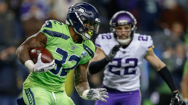 SEATTLE, WA - DECEMBER 10: Running back Chris Carson #32 of the Seattle Seahawks rushes against the Minnesota Vikings at CenturyLink Field on December 10, 2018 in Seattle, Washington.