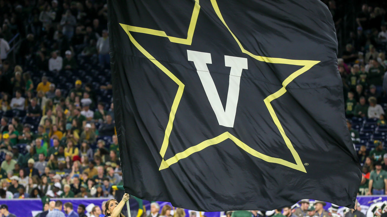 HOUSTON, TX - DECEMBER 27: Vanderbilt Commodores cheerleader waves the school flag during the Texas Bowl football game between the Baylor Bears and Vanderbilt Commodores on December 27, 2018 at NRG Stadium in Houston, Texas.