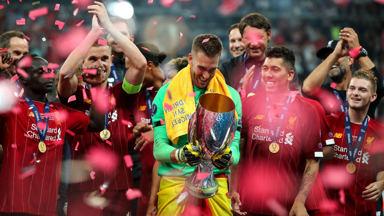 ISTANBUL, TURKEY - AUGUST 14: Adrian of Liverpool celebrates with the UEFA Super Cup trophy during the UEFA Super Cup Final fixture between Liverpool and Chelsea at Vodafone Park on August 14, 2019 in Istanbul, Turkey.