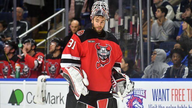 BRIDGEPORT, CT - NOVEMBER 7: Eddie Lack #31 of the Binghamton Devils makes his way back to the goal after a brief stoppage in play during a game against the Bridgeport Sound Tigers at the Webster Bank Arena on November 7, 2018 in Bridgeport, Connecticut.