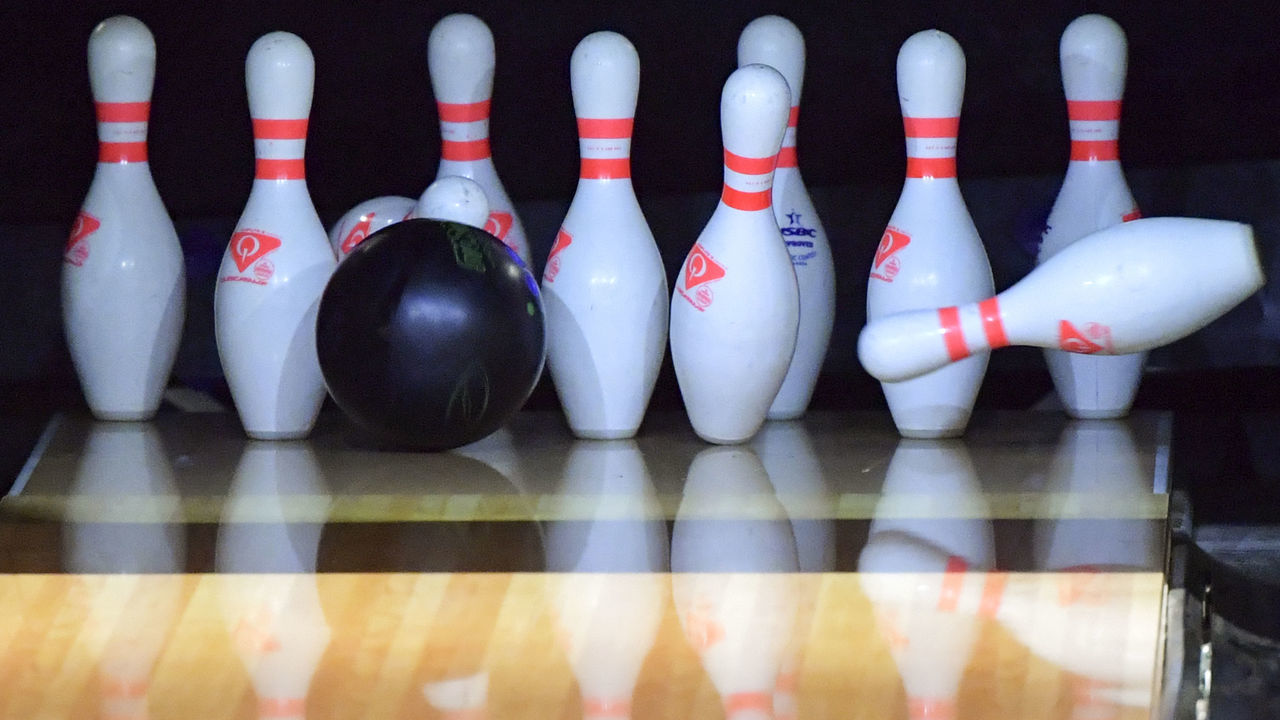 A bowling ball hits the pins during a Lima 2019 Pan-American Games Men's Doubles match in Lima, Peru, on July 25, 2019.