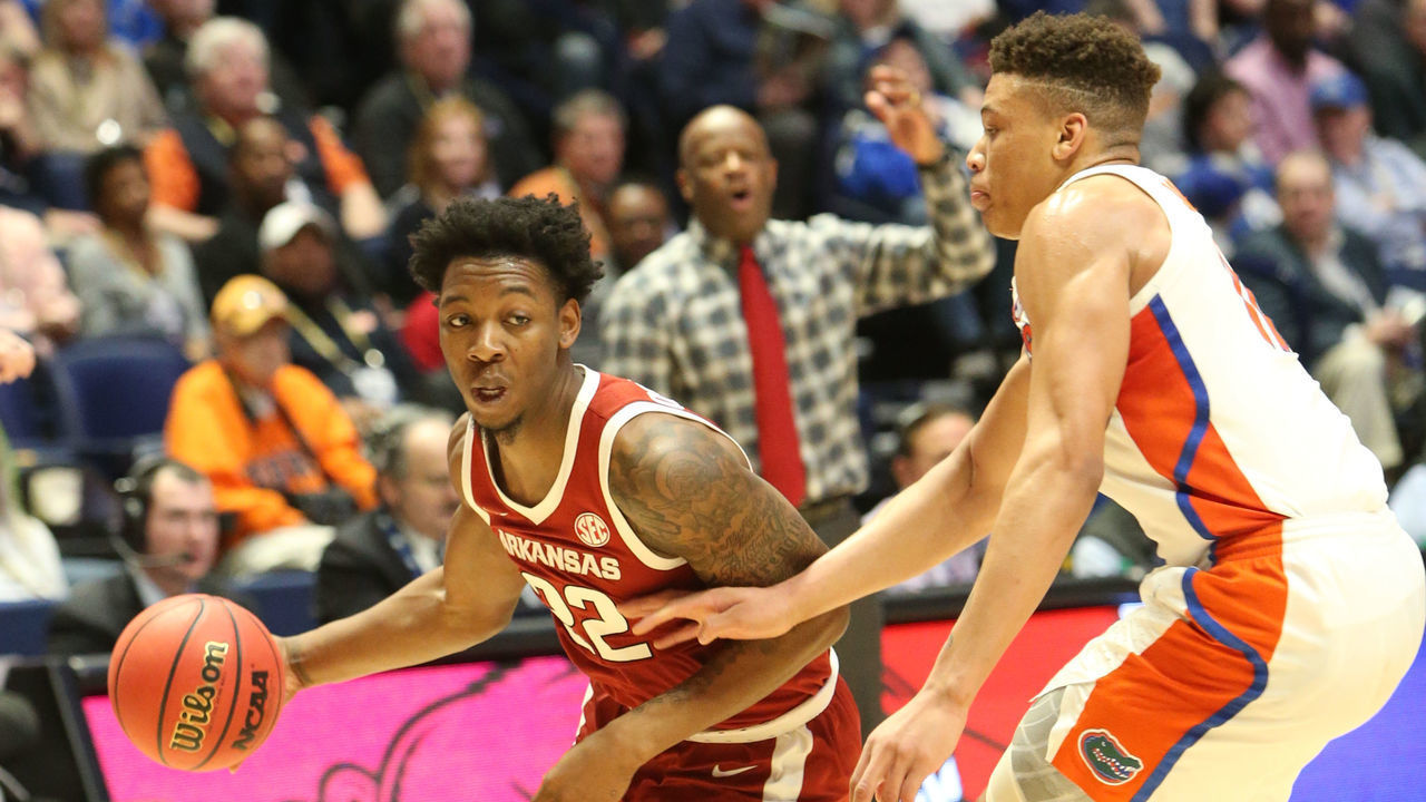 NASHVILLE, TN - MARCH 14: Arkansas Razorbacks guard Gabe Osabuohien (22) drives to the basket during a Southeastern Conference Tournament game between the Arkansas Razorbacks and Florida Gators, March 14, 2019, at Bridgestone Arena in Nashville, Tennessee.