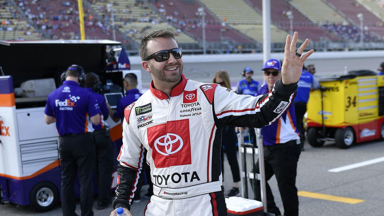BROOKLYN, MICHIGAN - AUGUST 09: Matt DiBenedetto, driver of the #95 Toyota Express Maintenance Toyota, waves to fans during qualifying for the Monster Energy NASCAR Cup Series Consumers Energy 400 at Michigan International Speedway on August 09, 2019 in Brooklyn, Michigan.