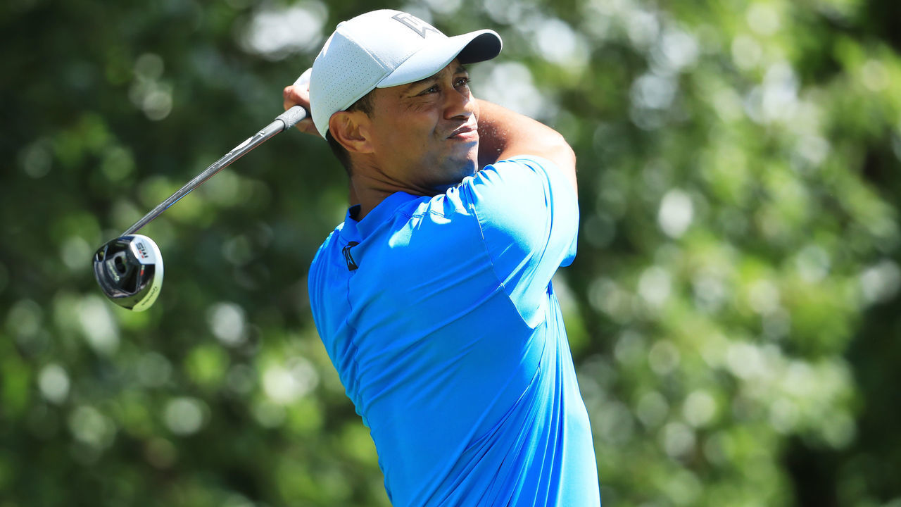 MEDINAH, ILLINOIS - AUGUST 15: Tiger Woods of the United States plays his shot from the third tee during the first round of the BMW Championship at Medinah Country Club No. 3 on August 15, 2019 in Medinah, Illinois.