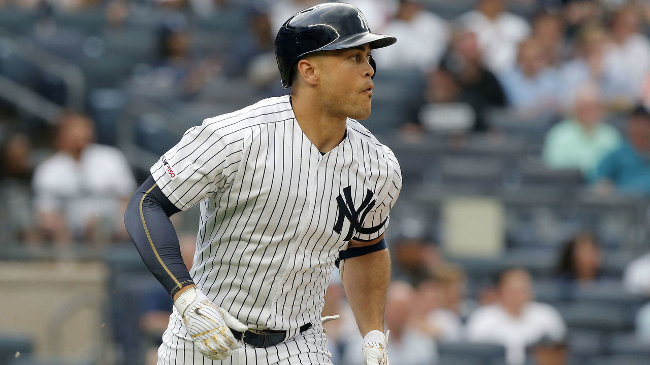 NEW YORK, NEW YORK - JUNE 25: Giancarlo Stanton #27 of the New York Yankees in action against the Toronto Blue Jays at Yankee Stadium on June 25, 2019 in New York City. The Yankees defeated the Blue Jays 4-3.
