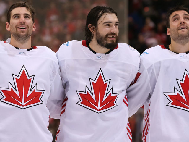 TORONTO, ON - SEPTEMBER 29: John Tavares #20, Drew Doughty #8 and Patrice Bergeron #37 of Team Canada enjoy their national anthem after a 2-1 win over Team Europe during Game Two of the World Cup of Hockey final series at the Air Canada Centre on September 29, 2016 in Toronto, Ontario, Canada.