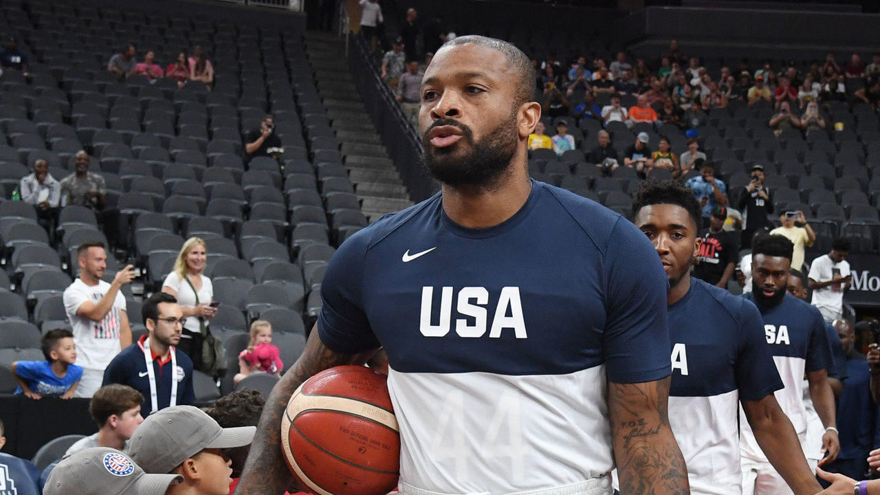 LAS VEGAS, NEVADA - AUGUST 09: P.J. Tucker #44 of the 2019 USA Men's National Team is greeted by people being assisted by the Tragedy Assistance Program for Survivors (TAPS) before the 2019 USA Basketball Men's National Team Blue-White exhibition game at T-Mobile Arena on August 9, 2019 in Las Vegas, Nevada.