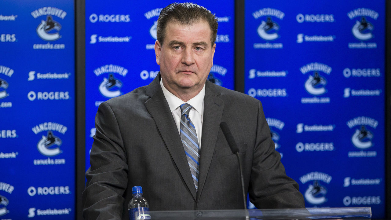 VANCOUVER, BC - FEBRUARY 28: Vancouver Canucks General Manager Jim Benning speaks to the media after a game between against the Vancouver Canucks and Detroit Red Wings. Benning was discussing the recent trades of Vancouver Canucks Left Wing Alexandre Burrows (14) and Vancouver Canucks Right Wing Jannik Hansen (36). February 28, 2017, at Rogers Arena in Vancouver, BC.