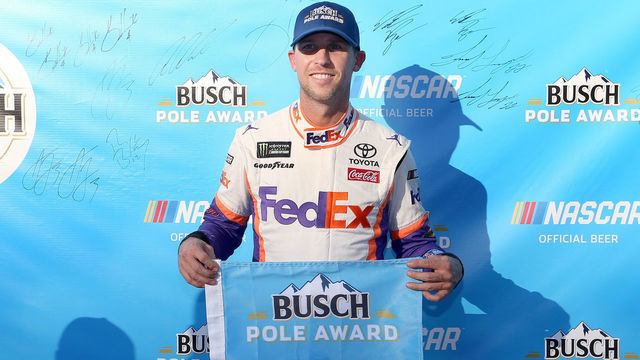 BRISTOL, TENNESSEE - AUGUST 16: Denny Hamlin, driver of the #11 FedEx Freight Toyota, celebrates with the Pole Award qualifying for the Monster Energy NASCAR Cup Series Bass Pro Shops NRA Night Race at Bristol Motor Speedway on August 16, 2019 in Bristol, Tennessee.