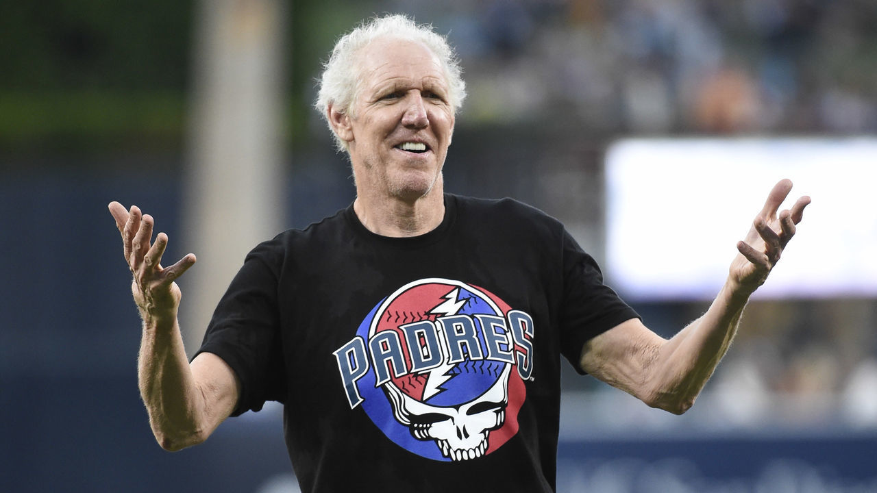 SAN DIEGO, CA - AUGUST 8: Former NBA player Bill Walton player throws out the first pitch before a baseball game between the San Diego Padres and the Colorado Rockies at Petco Park August 8, 2019 in San Diego, California.