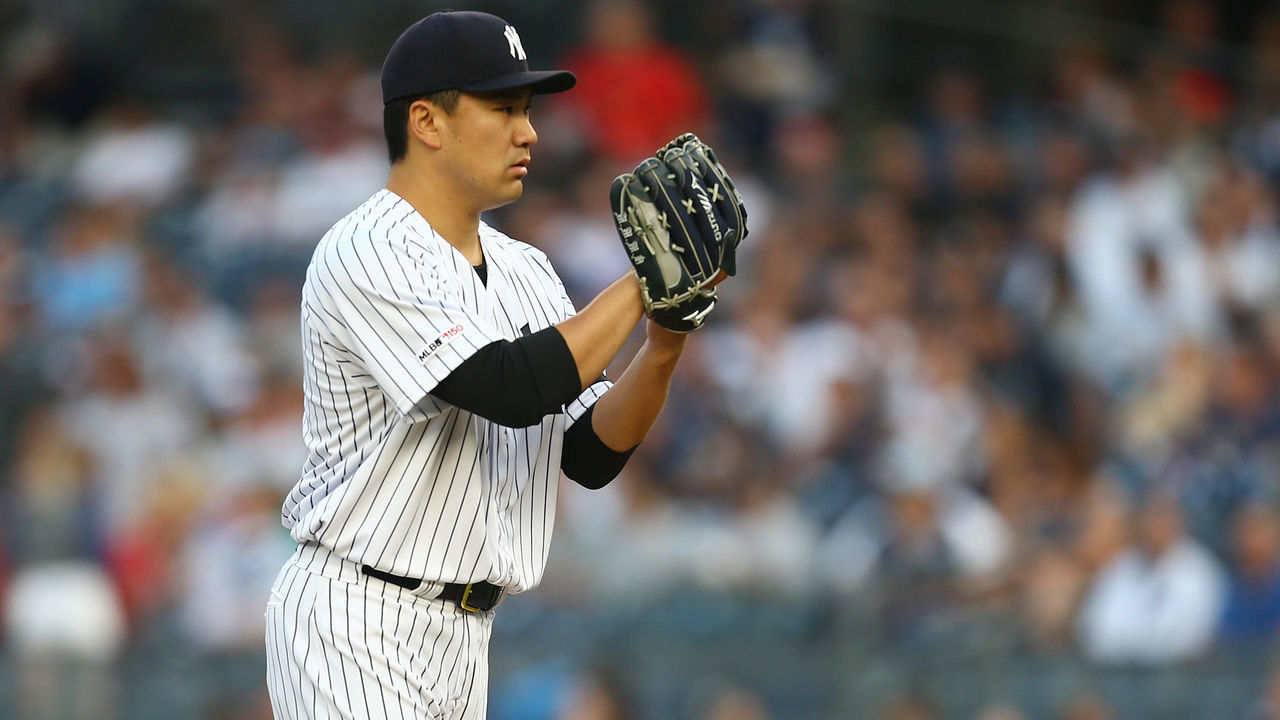 NEW YORK, NEW YORK - AUGUST 16: Masahiro Tanaka #19 of the New York Yankees pitches in the first inning against the Cleveland Indians at Yankee Stadium on August 16, 2019 in New York City. New York Yankees defeated the Cleveland Indians 3-2